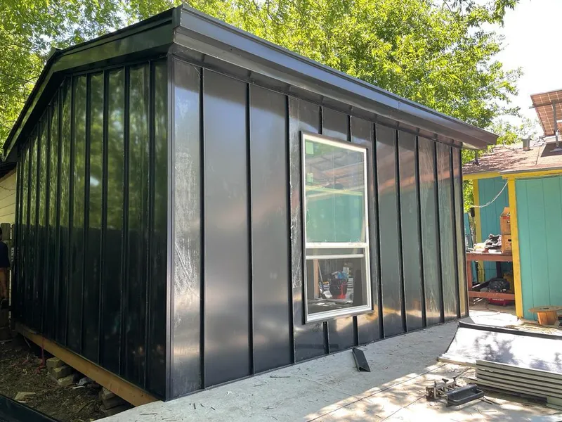 Black standing seam metal wall panels for Roof Inspection in Roseville